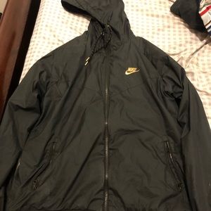 black n gold nike windbreaker